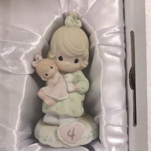 Growing in grace”4” precious moments figurine